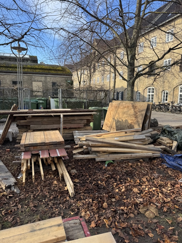 stack of timber on the lawn